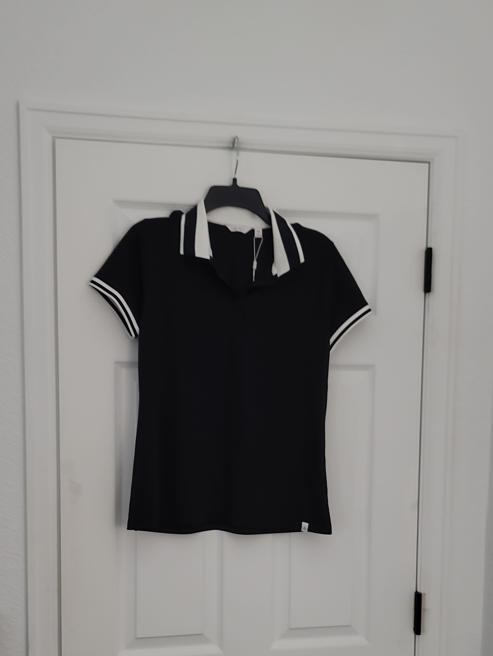 Lady Hagen Black Polo Top with White Trim